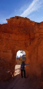 John resting under arch