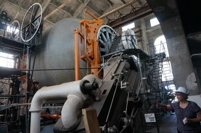 Operator station, hoist drum, and engine